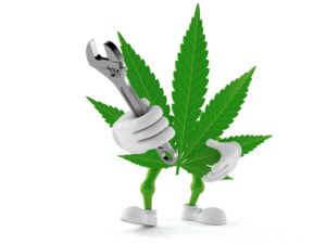 Cannabis character holding adjustable wrench