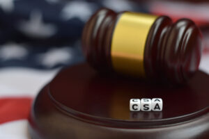 Justice mallet and CSA acronym close up. Controlled substances act